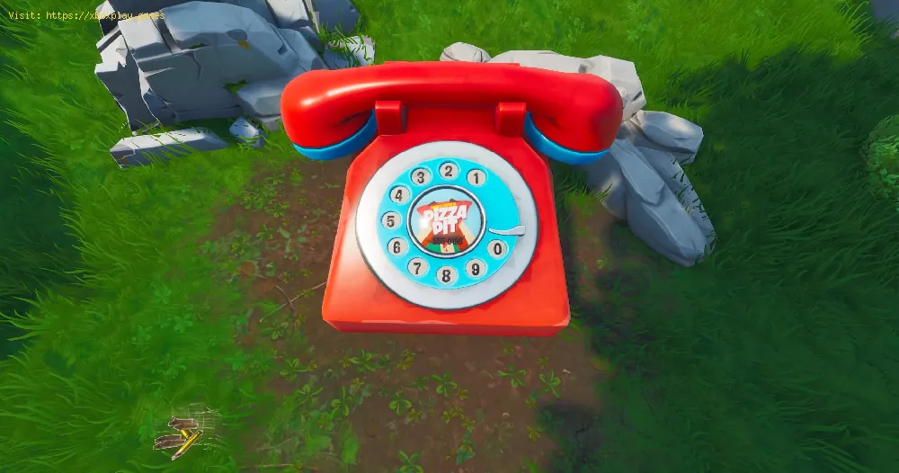 Complete the Visit to the Big Phone, big Piano and Dancing Fish Trophy in Fortnite week 2 Season 9