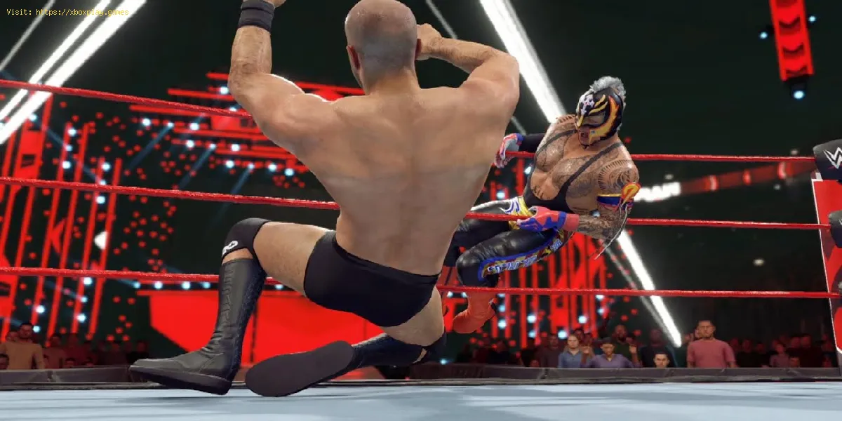 WWE 2K22 : comment effectuer une attaque en plongée à cordes moyennes