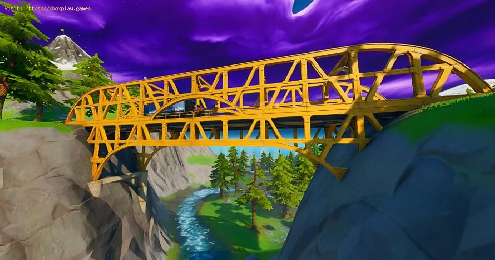 Fortnite: where to dance at a green, red, and yellow steel bridge